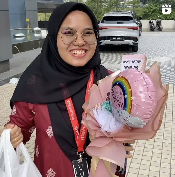 Smiling person receiving delivery