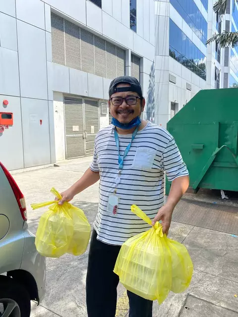 Smiling person receiving delivery